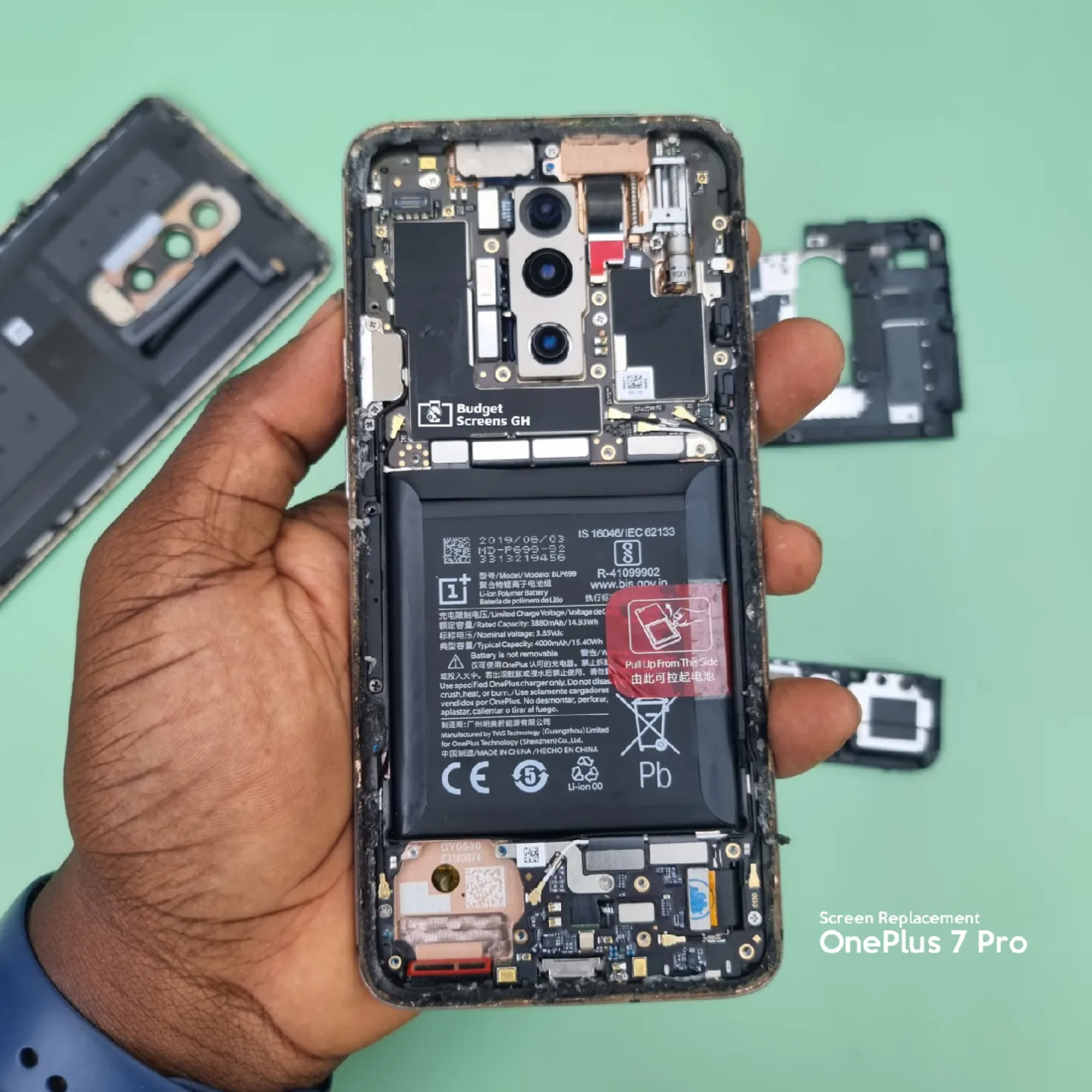Technician repairing phone